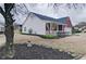 Charming single-story home with brick and vinyl siding, landscaping at 732 Jacoby Dr, Loganville, GA 30052