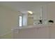 Kitchen area with breakfast bar, leading to the back entrance at 732 Jacoby Dr, Loganville, GA 30052
