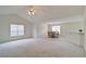 Spacious living area with lots of natural light and neutral walls at 732 Jacoby Dr, Loganville, GA 30052