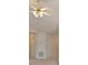 Close-up of a modern ceiling fan in an open and airy living space with access to hallways at 732 Jacoby Dr, Loganville, GA 30052