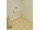 Minimalist utility room with white walls and vinyl flooring at 732 Jacoby Dr, Loganville, GA 30052