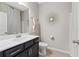 Modern bathroom featuring a sleek vanity, stylish mirror, and neutral color palette, creating a serene space at , Duluth, GA 30096