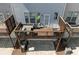 Cozy wooden deck featuring patio furniture, grill and a view creating an inviting outdoor living space at , Duluth, GA 30096