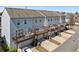 View of townhomes featuring rear decks and garages at , Duluth, GA 30096