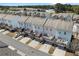 Aerial view of townhomes with decks over garages and neat landscaping at , Duluth, GA 30096