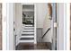 Inviting home foyer featuring hardwood floors, stairs, and neutral decor at , Duluth, GA 30096