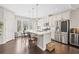 Bright kitchen with stainless steel appliances, island seating, and ample cabinet space at , Duluth, GA 30096