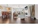 Spacious living room featuring hardwood floors, fireplace, dining area and stylish decor at , Duluth, GA 30096