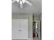 Spacious bedroom features double doors and access to the hallway at 3426 Olivia Grace Way, Dacula, GA 30019