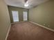 A bedroom featuring two windows providing natural light at 3426 Olivia Grace Way, Dacula, GA 30019