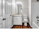 Bathroom features a single sink vanity and a shower and tub combo at 4970 Wewatta Sw St, Atlanta, GA 30331