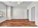 The bedroom is spacious, featuring a fan, closet, and large window at 4970 Wewatta Sw St, Atlanta, GA 30331