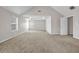 Spacious bedroom featuring a window and neutral carpeting at 4970 Wewatta Sw St, Atlanta, GA 30331