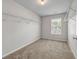 Organized closet features wire shelving and a window for natural light at 4970 Wewatta Sw St, Atlanta, GA 30331