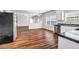 Open kitchen features stainless appliances and laminate flooring at 4970 Wewatta Sw St, Atlanta, GA 30331
