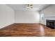 Spacious living room with beautiful hardwood floors and a cozy fireplace at 4970 Wewatta Sw St, Atlanta, GA 30331