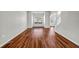 Bright living room features laminate flooring, natural light, and neutral walls at 4970 Wewatta Sw St, Atlanta, GA 30331