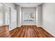 The office features laminate floors, bright light, and neutral walls at 4970 Wewatta Sw St, Atlanta, GA 30331
