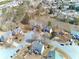 Community aerial view with ponds and tree-lined streets at 1484 Highland Bluff Ct, Suwanee, GA 30024