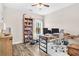 Bright home office features a large desk, bookcase, and ample natural light at 180 Allie Dr, Mcdonough, GA 30252