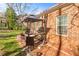 Charming outdoor patio with ample seating space for relaxing or entertaining at 230 Rosenwald Ln, Hampton, GA 30228