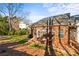 Brick backyard patio has outdoor seating for entertaining guests at 230 Rosenwald Ln, Hampton, GA 30228