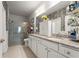 Bathroom featuring double sink vanity and large, walk-in shower at 230 Rosenwald Ln, Hampton, GA 30228