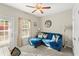 Cozy bonus room with comfortable seating and natural light at 230 Rosenwald Ln, Hampton, GA 30228