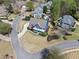 Aerial view of an attractive property in a neighborhood, complete with mature trees and a well-kept lawn at 302 Meadow Lark Xing, Canton, GA 30114