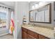 Bathroom with granite countertops and a tub/shower combination at 302 Meadow Lark Xing, Canton, GA 30114