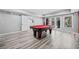 Game room with a pool table and a sliding glass door leading to an outdoor space for entertaining at 302 Meadow Lark Xing, Canton, GA 30114
