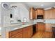 Cozy kitchen with a breakfast bar area and modern finishes at 302 Meadow Lark Xing, Canton, GA 30114