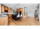 Kitchen area adjacent to dining area and hardwood floors at 302 Meadow Lark Xing, Canton, GA 30114