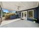 Covered patio with ceiling fan, perfect for outdoor entertaining at 302 Meadow Lark Xing, Canton, GA 30114