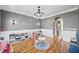Bright playroom with hardwood floors and organized storage units at 302 Meadow Lark Xing, Canton, GA 30114