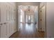 Bright foyer with wood flooring and a clear view to the front door at 3020 Templeton Ln, Loganville, GA 30052