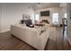 Bright living room features a fireplace, vaulted ceiling and neutral décor providing a cozy atmosphere at 3020 Templeton Ln, Loganville, GA 30052