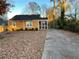 Charming single story home featuring a screened in porch and long drive way at 488 Mcwilliams Se Ave, Atlanta, GA 30316