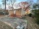 Back of house featuring concrete patio, back door, and partially fenced in yard at 488 Mcwilliams Se Ave, Atlanta, GA 30316
