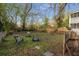 Spacious backyard with mature trees and plenty of room for outdoor activities at 1090 Harwell Nw St, Atlanta, GA 30314