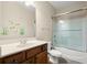 Bathroom with vanity and shower, decorated with a lovely decorative wall motif at 1917 Baxley Pine Trce, Suwanee, GA 30024