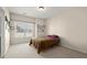 Cozy bedroom with a large window allowing plenty of natural light to fill the room at 1917 Baxley Pine Trce, Suwanee, GA 30024