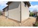 Back side of home with vinyl siding and small yard at 1917 Baxley Pine Trce, Suwanee, GA 30024