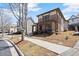 Charming brick home on a neighborhood street, featuring a covered driveway and landscaping at 1917 Baxley Pine Trce, Suwanee, GA 30024