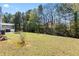 Expansive backyard featuring a lush lawn and a deck, perfect for outdoor entertaining at 1979 Resting Creek Dr, Decatur, GA 30035
