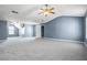 Large carpeted bedroom with ceiling fan, neutral paint and recessed lighting at 1979 Resting Creek Dr, Decatur, GA 30035