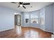 Inviting living room featuring hardwood floors, lots of windows and gray walls at 1979 Resting Creek Dr, Decatur, GA 30035