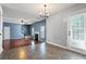 Inviting living room with hardwood floors, fireplace, and abundant natural light at 1979 Resting Creek Dr, Decatur, GA 30035
