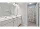 Clean bathroom features dual sinks, vanity, and a shower-tub combo at 273 Amylou Cir, Woodstock, GA 30188