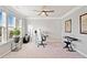 Spacious home office with carpet, a ceiling fan, and bright windows at 273 Amylou Cir, Woodstock, GA 30188